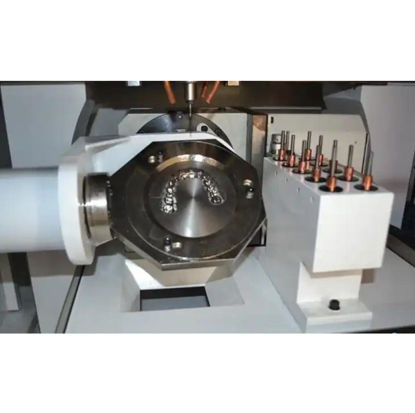 Tooth carving machine